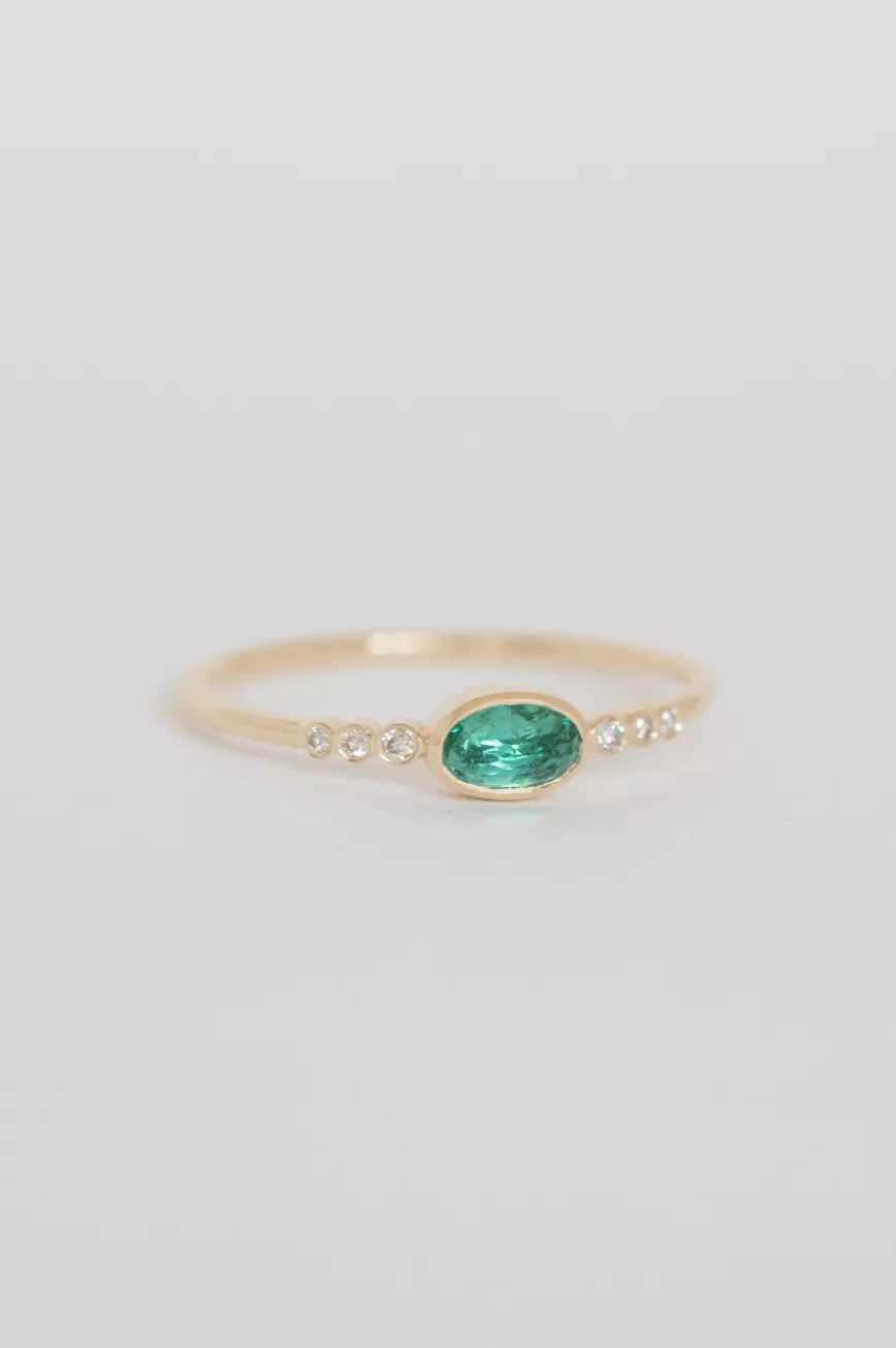 Yellow gold ring oval emerald diamond accent band Celine Daoust