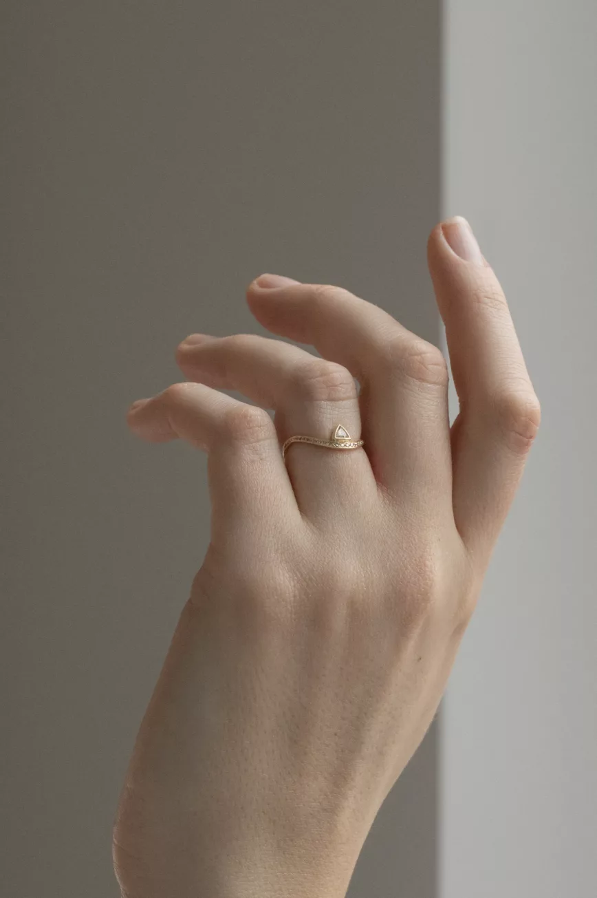 Yellow gold wave ring triangle champagne diamond pavé diamond curved band Celine Daoust