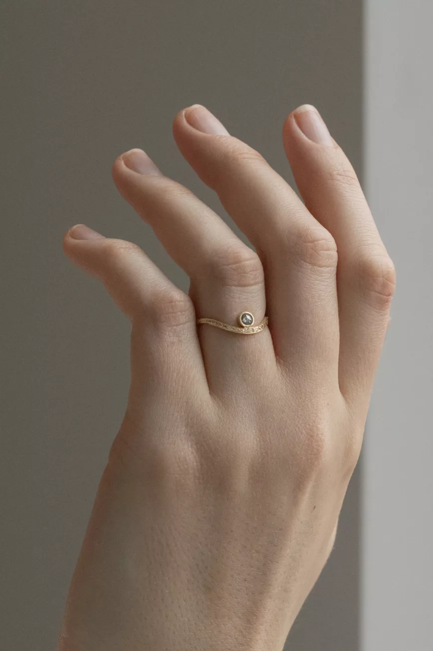 Yellow gold wave ring round grey diamond pavé diamond curved band Celine Daoust