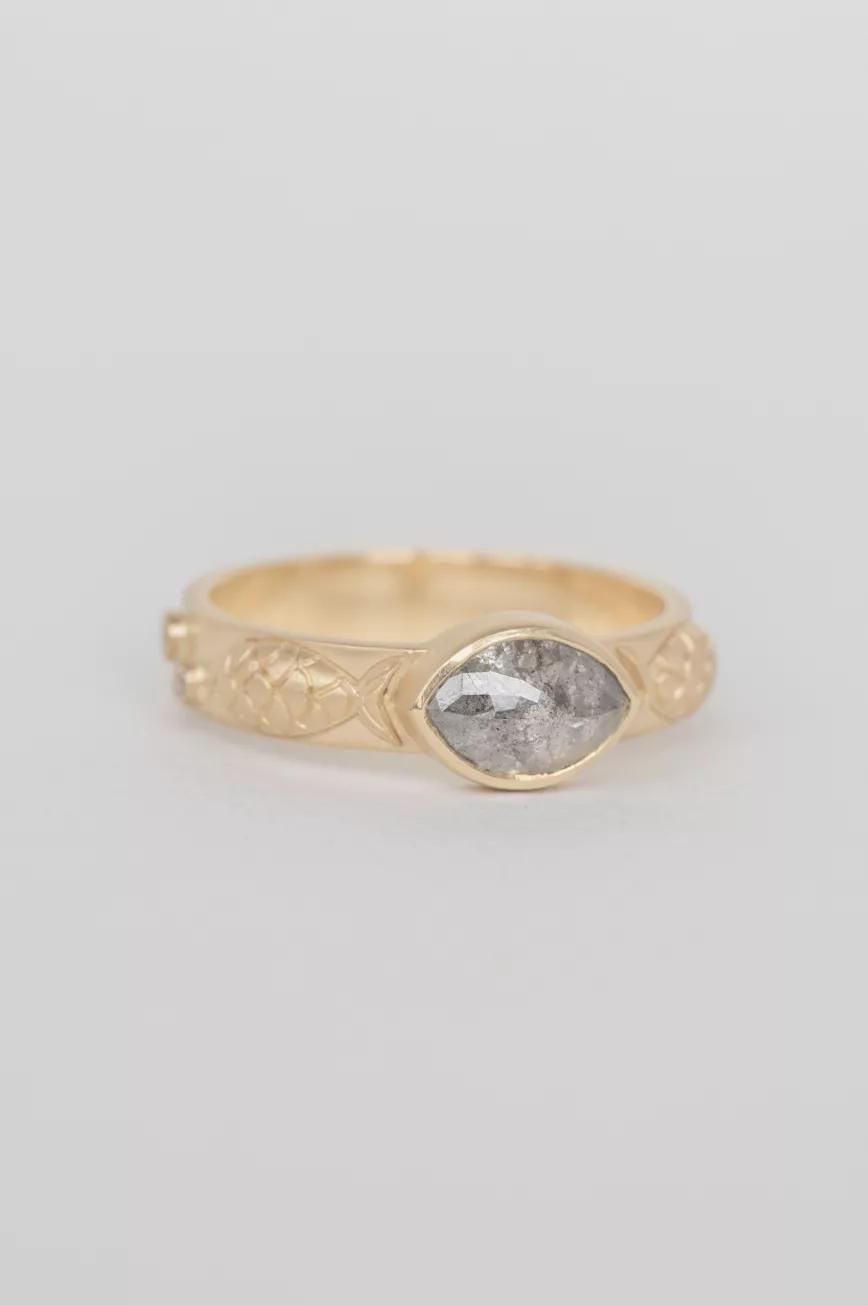 Yellow gold engraved band ring oval grey diamond fish motif Celine Daoust