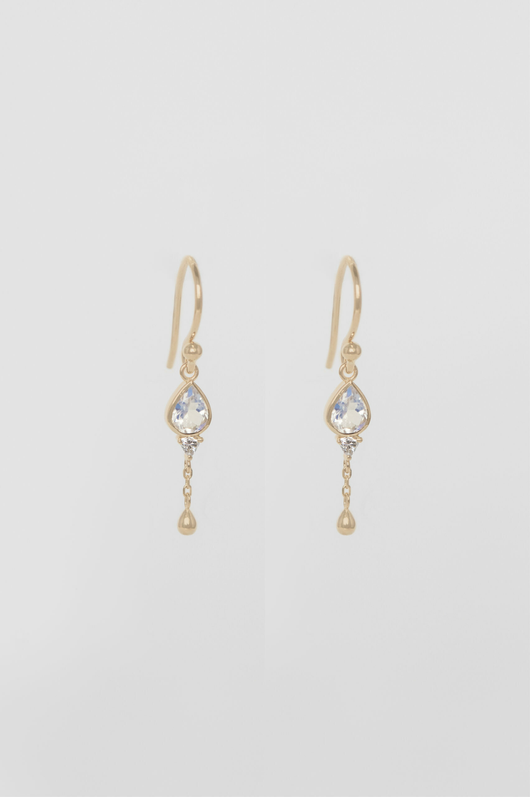 Gold drop earrings pear-cut moonstone bezel diamond accent gold ball Céline Daoust
