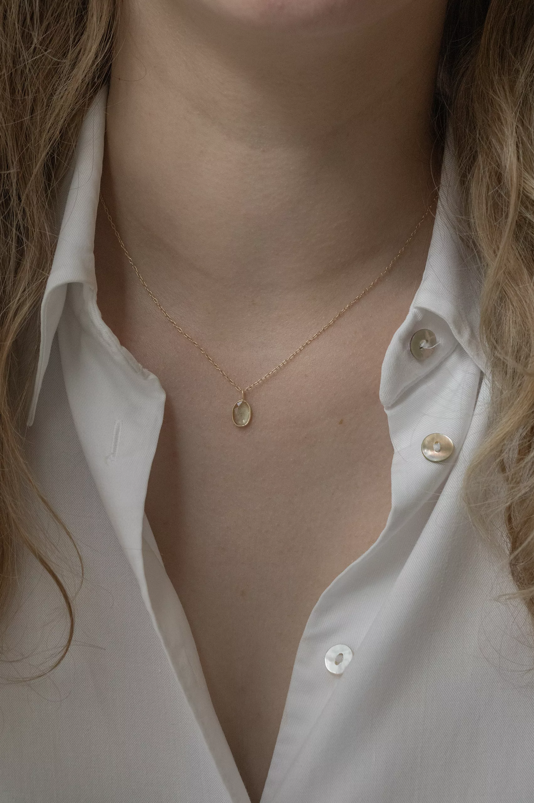 Yellow gold necklace oval light green tourmaline bezel pendant delicate chain Celine Daoust