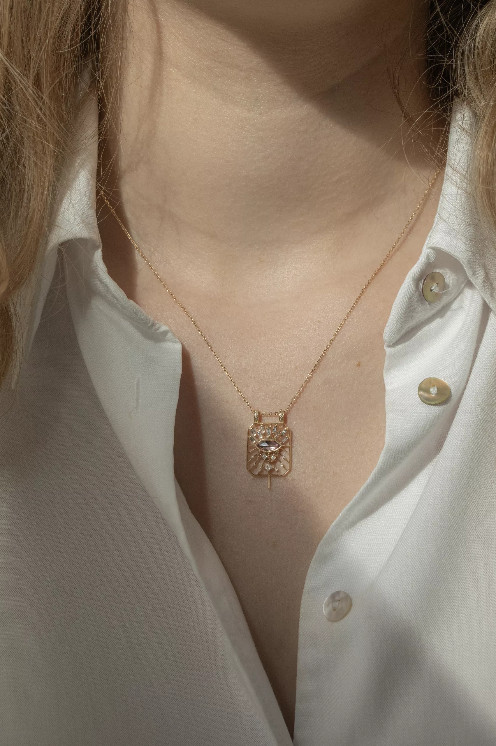 Yellow gold necklace open rectangle pendant marquise pink tourmaline eye motif Celine Daoust