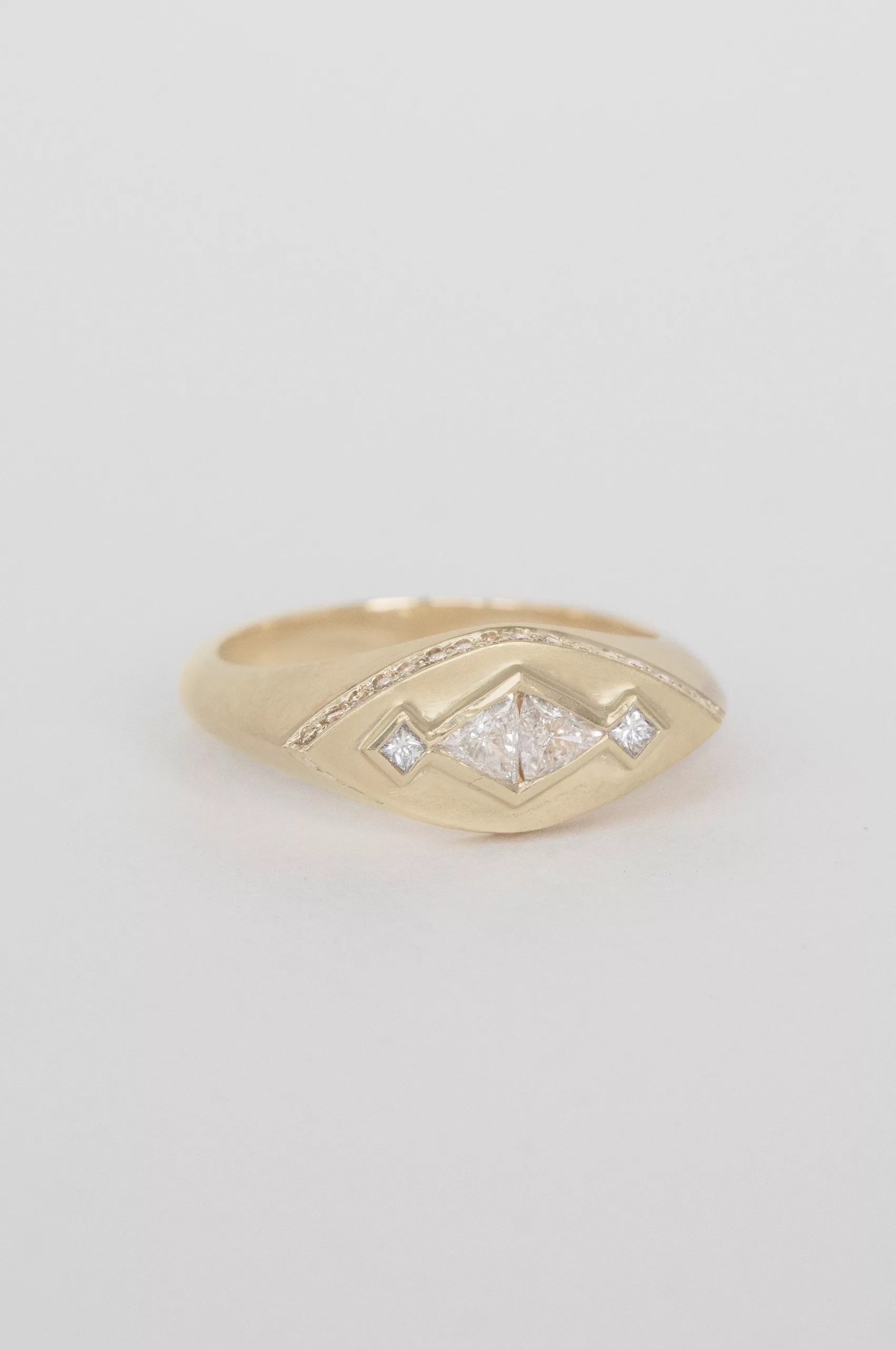 Yellow gold signet ring geometric diamond pyramid motif pavé band Celine Daoust