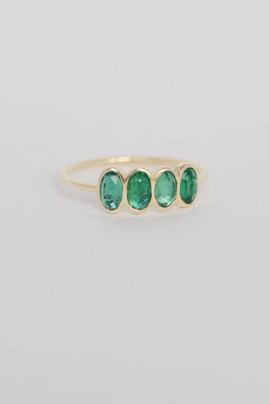 Yellow gold ring four oval emerald bezel set band Celine Daoust