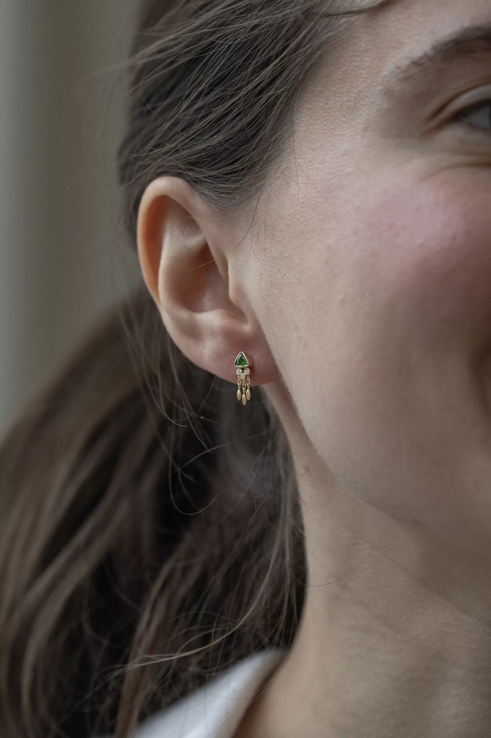Yellow gold single stud earring trillion green tourmaline dangling diamond drops Celine Daoust