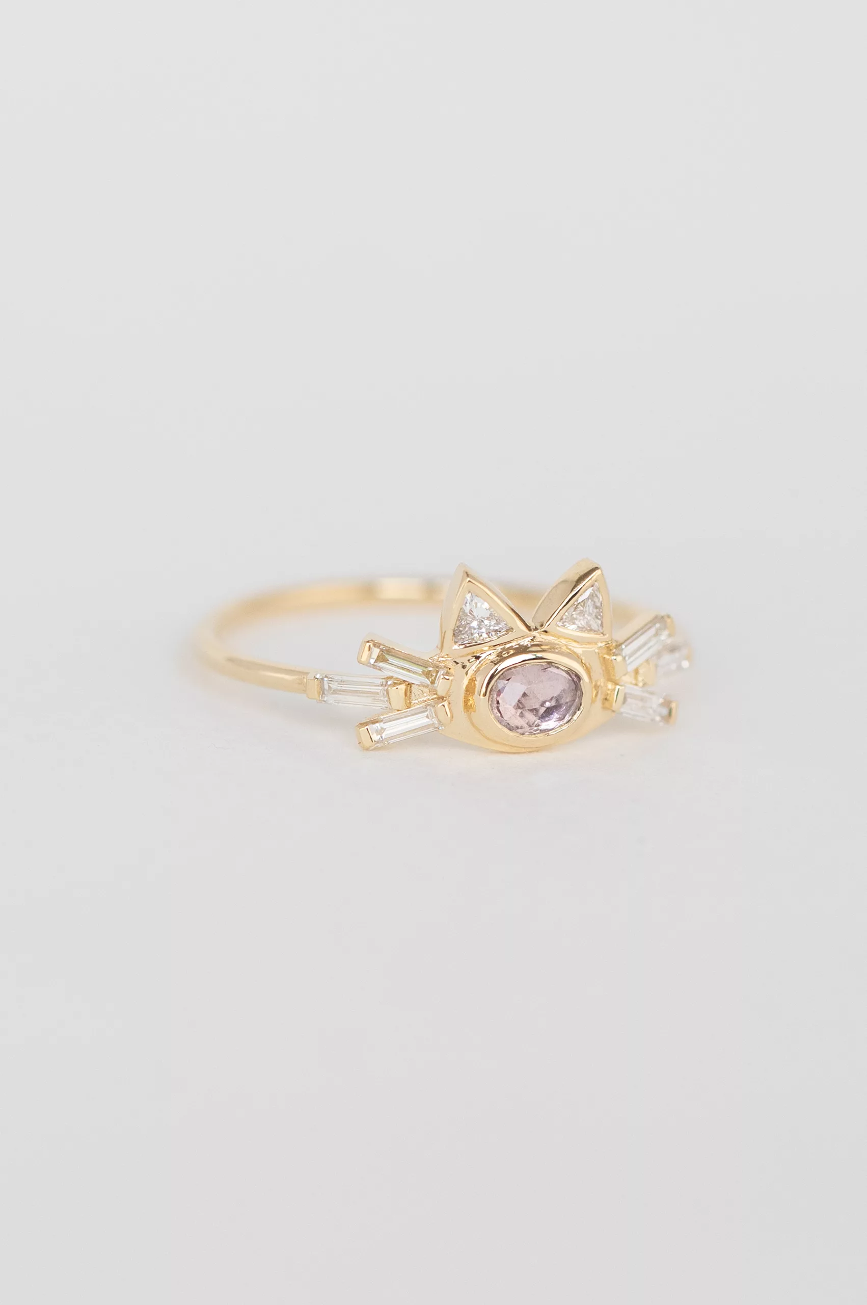 Yellow gold ring oval light pink tourmaline cat ear baguette diamond motif Celine Daoust