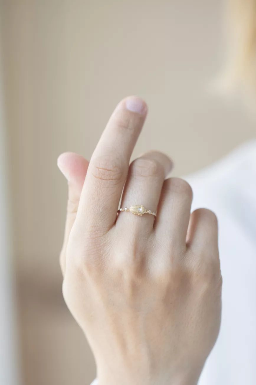 Gold ring sculpted scarab motif diamond accents Céline Daoust