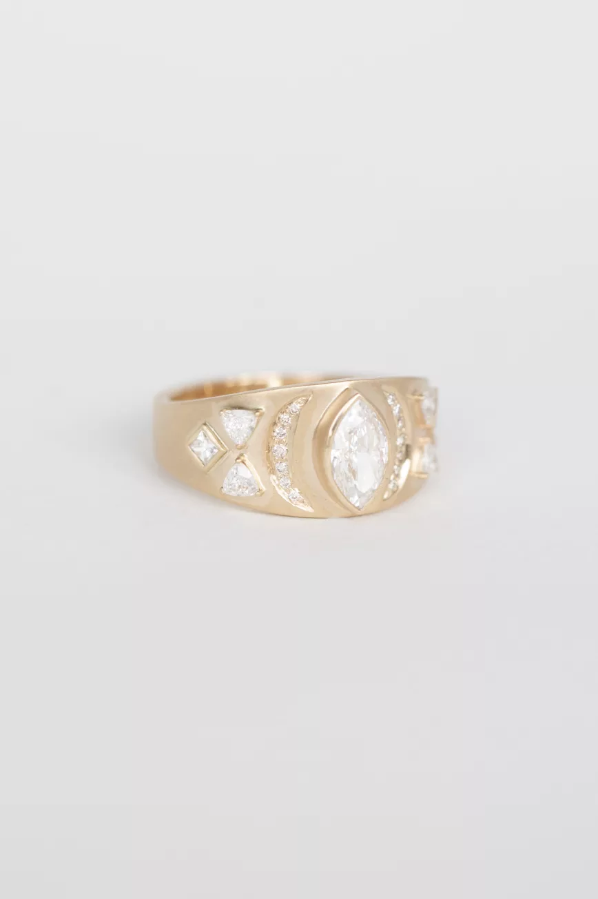 Yellow gold signet ring marquise diamond geometric engraved motif Céline Daoust
