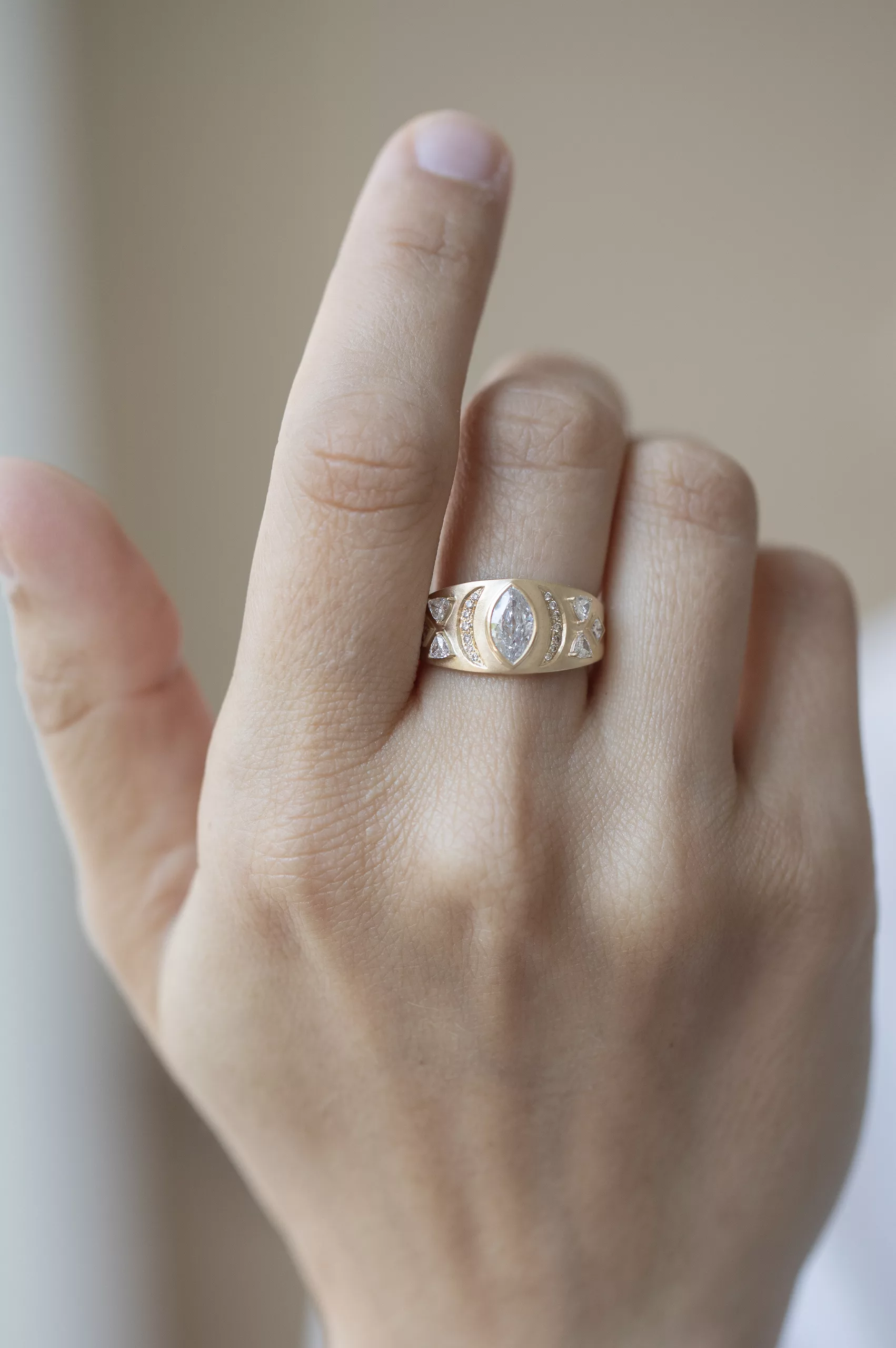 Yellow gold signet ring marquise diamond geometric engraved motif Céline Daoust