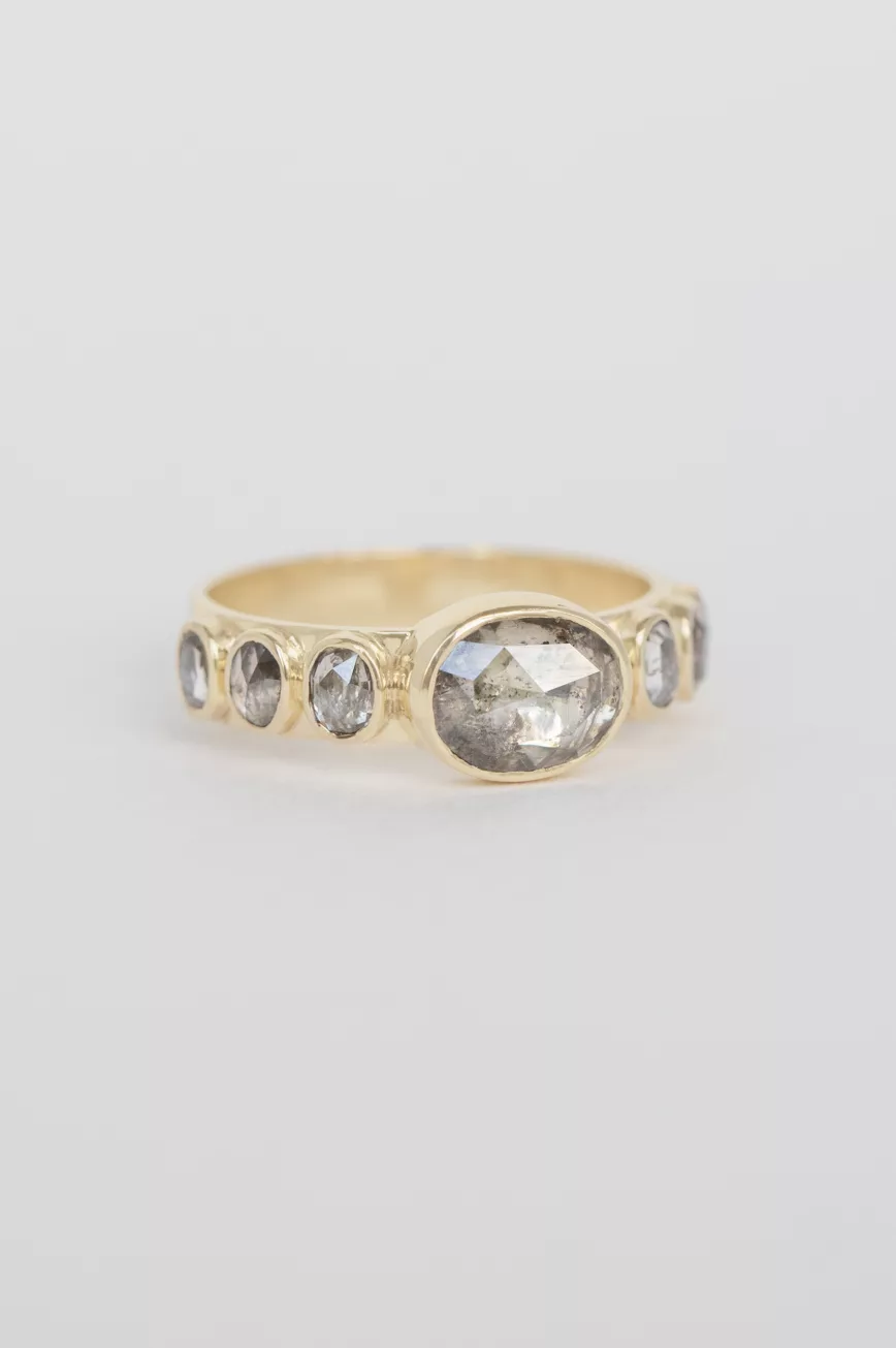 Yellow gold wide band ring oval grey diamond six grey diamond accents Celine Daoust