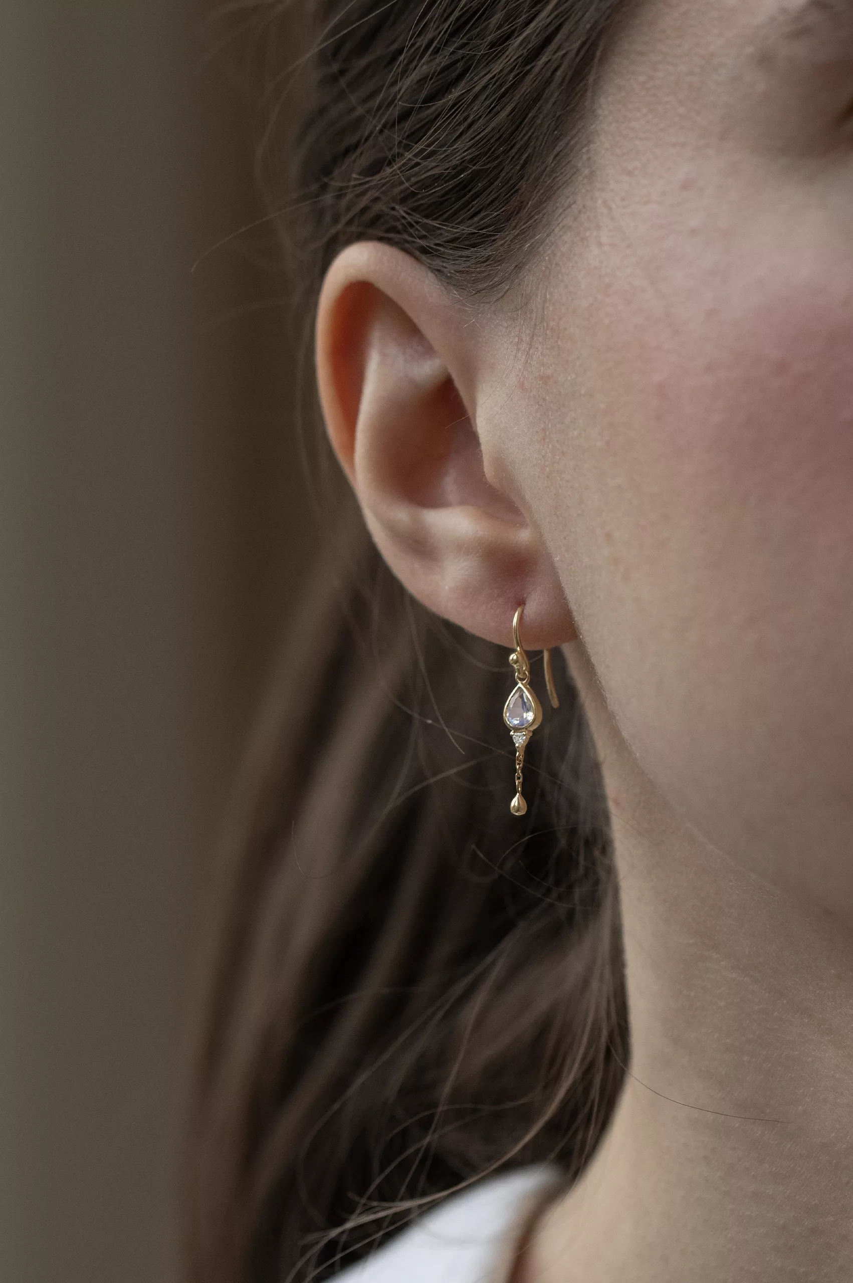 Gold drop earrings pear-cut moonstone bezel diamond accent gold ball Céline Daoust