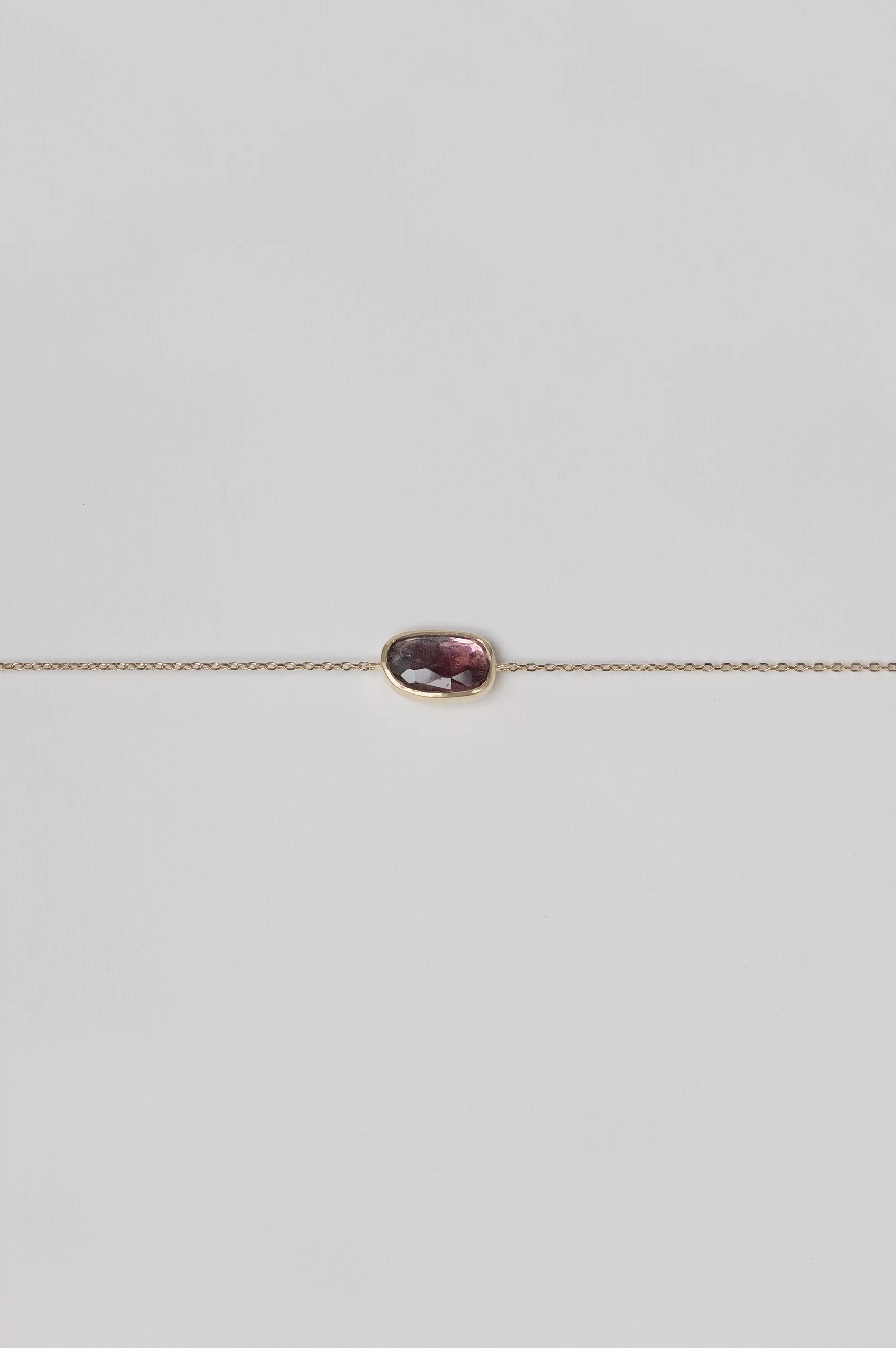 Yellow gold chain bracelet single oval pink tourmaline bezel station Celine Daoust