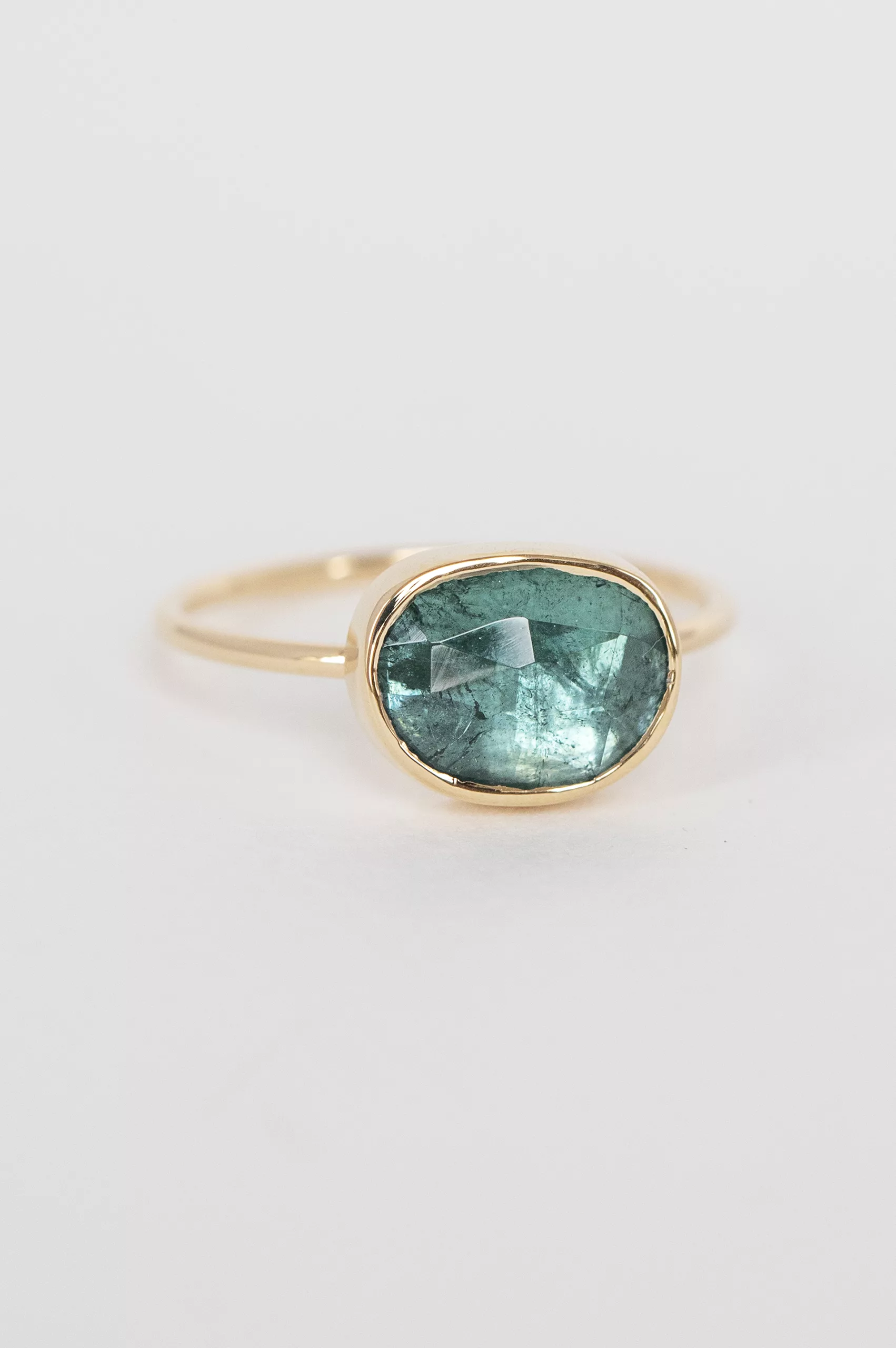 Yellow gold ring large oval turquoise tourmaline open bezel slim band Celine Daoust