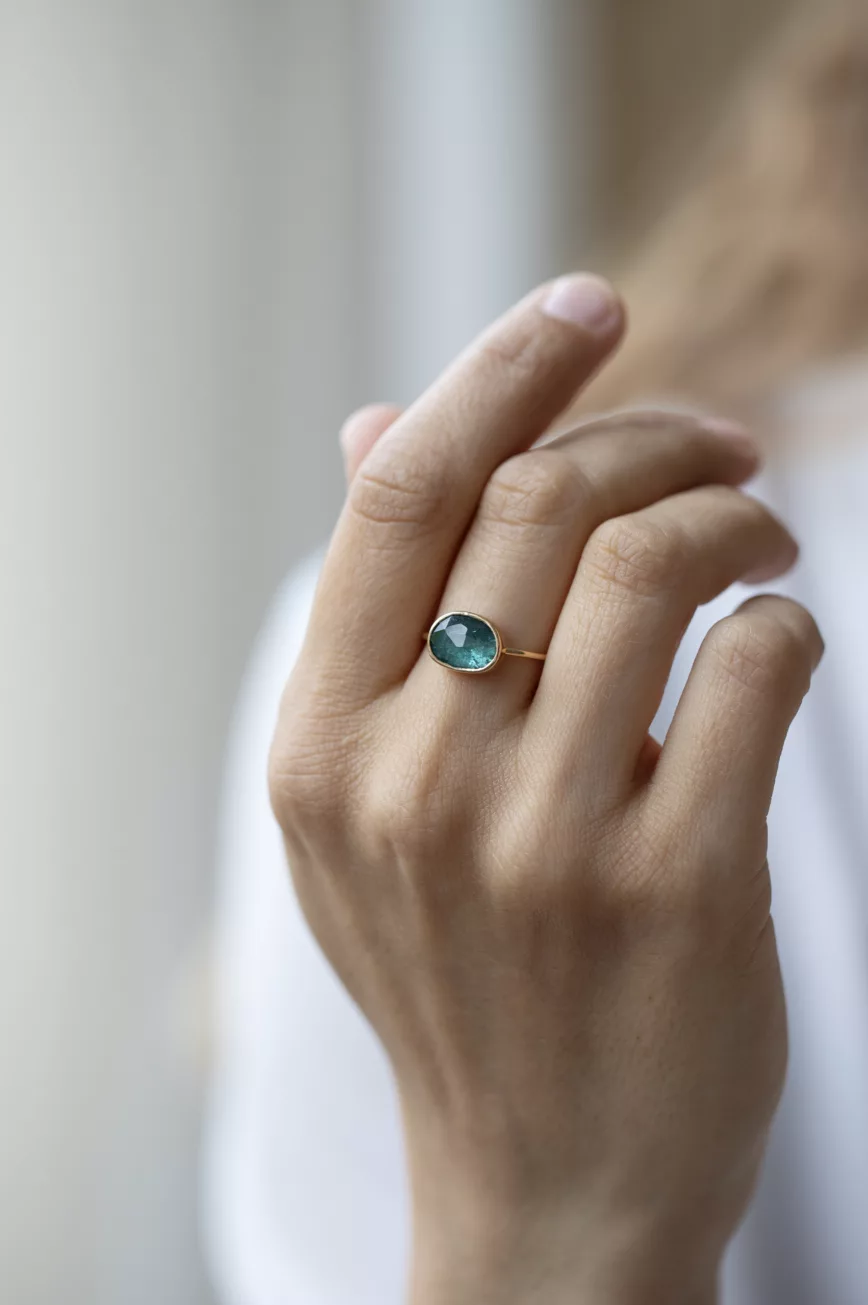 Yellow gold ring large oval turquoise tourmaline open bezel slim band Celine Daoust