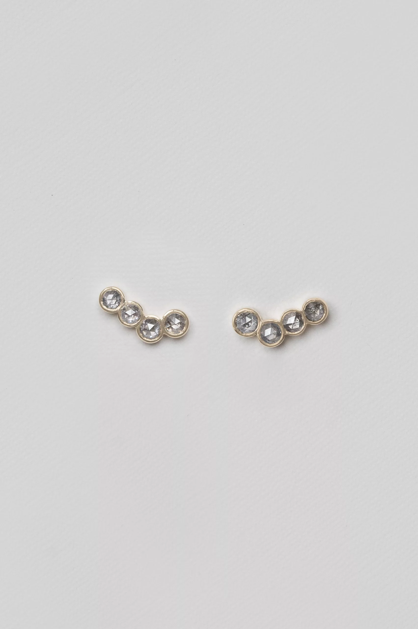 Yellow gold ear climber earrings four light grey diamonds pair Celine Daoust