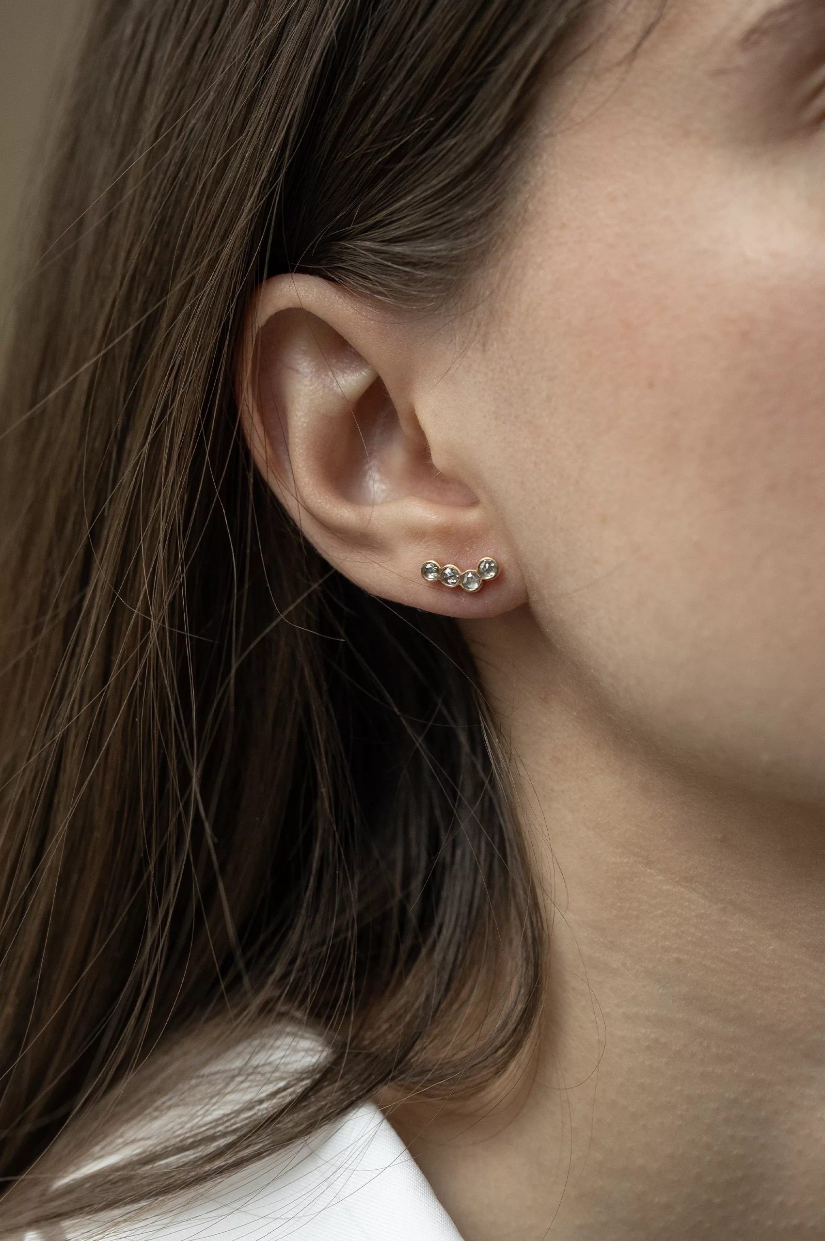Yellow gold ear climber earrings four light grey diamonds pair Celine Daoust