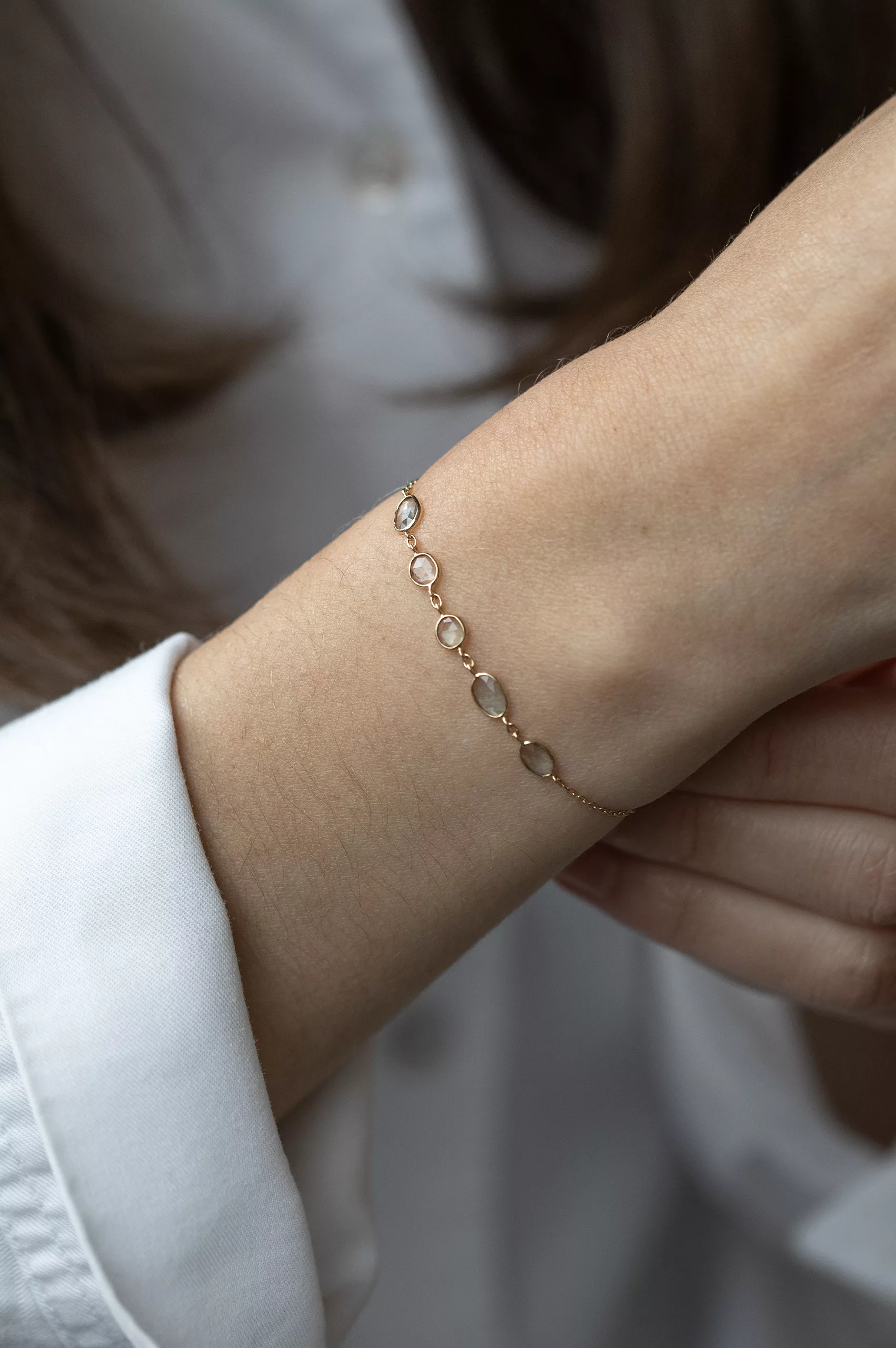 Yellow gold chain bracelet multiple oval blue tourmaline bezel stations Celine Daoust