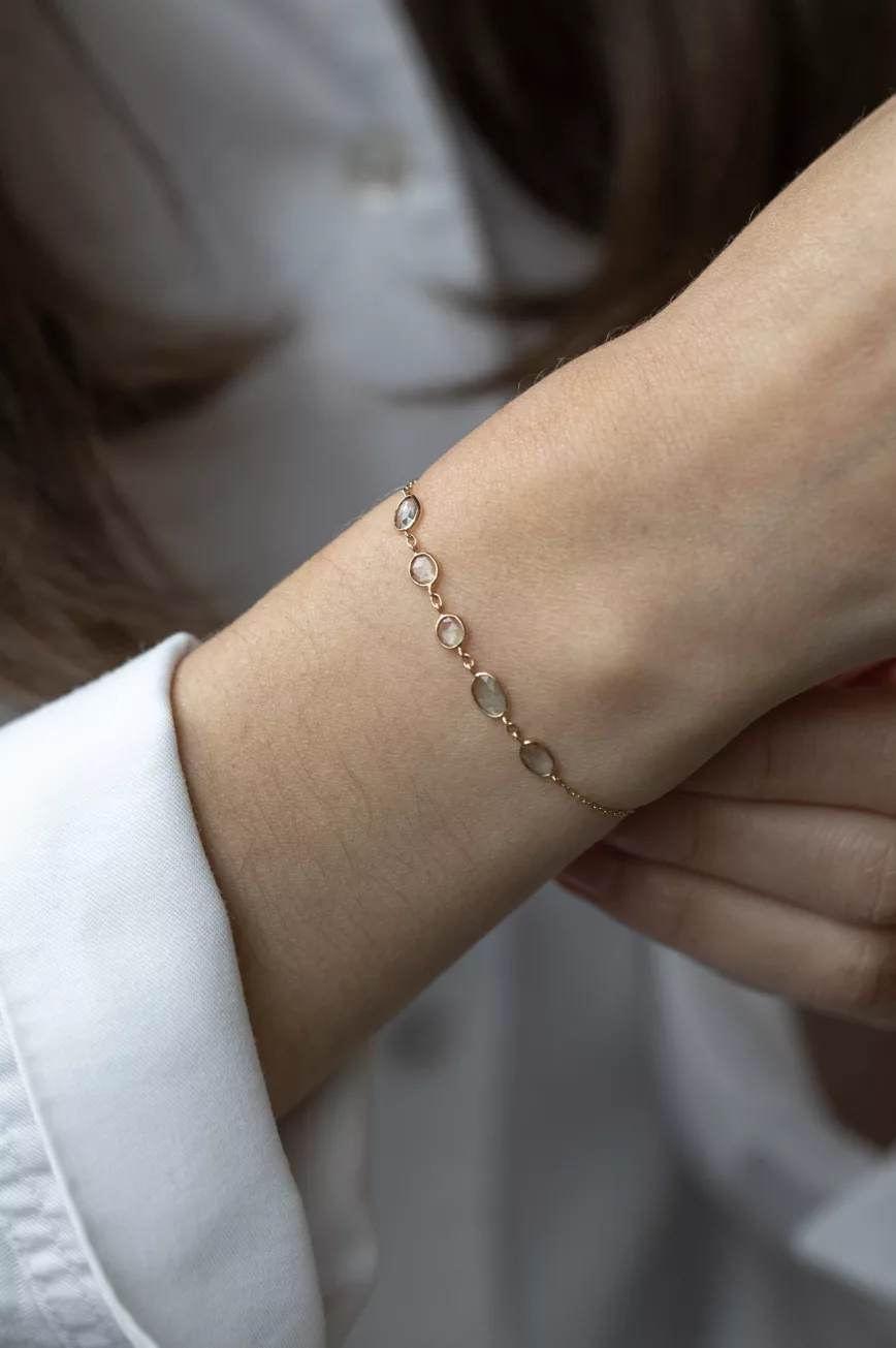 Yellow gold chain bracelet multiple oval blue tourmaline bezel stations Celine Daoust