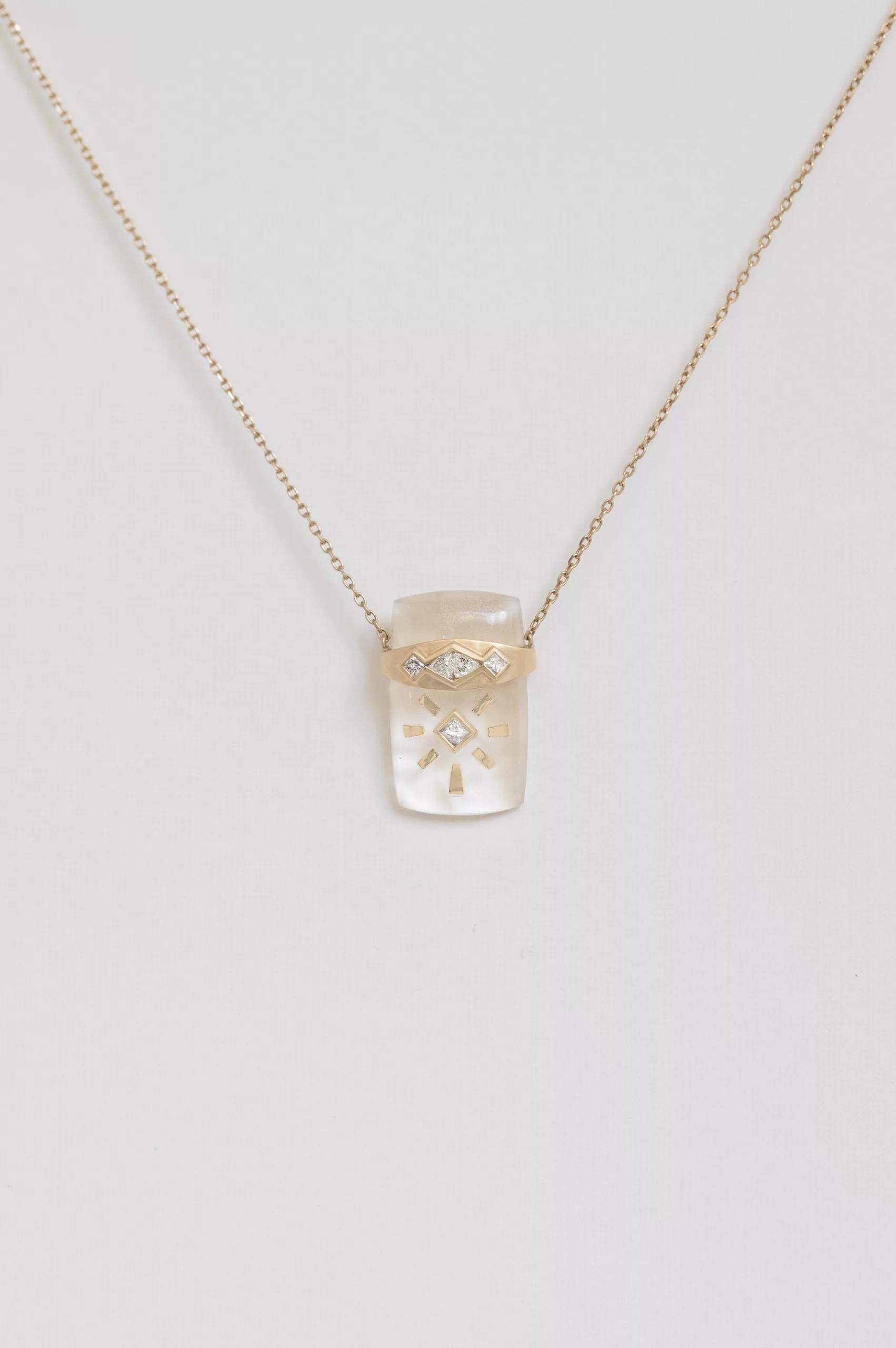 Gold necklace carved crystal quartz sun pendant diamond accents Céline Daoust