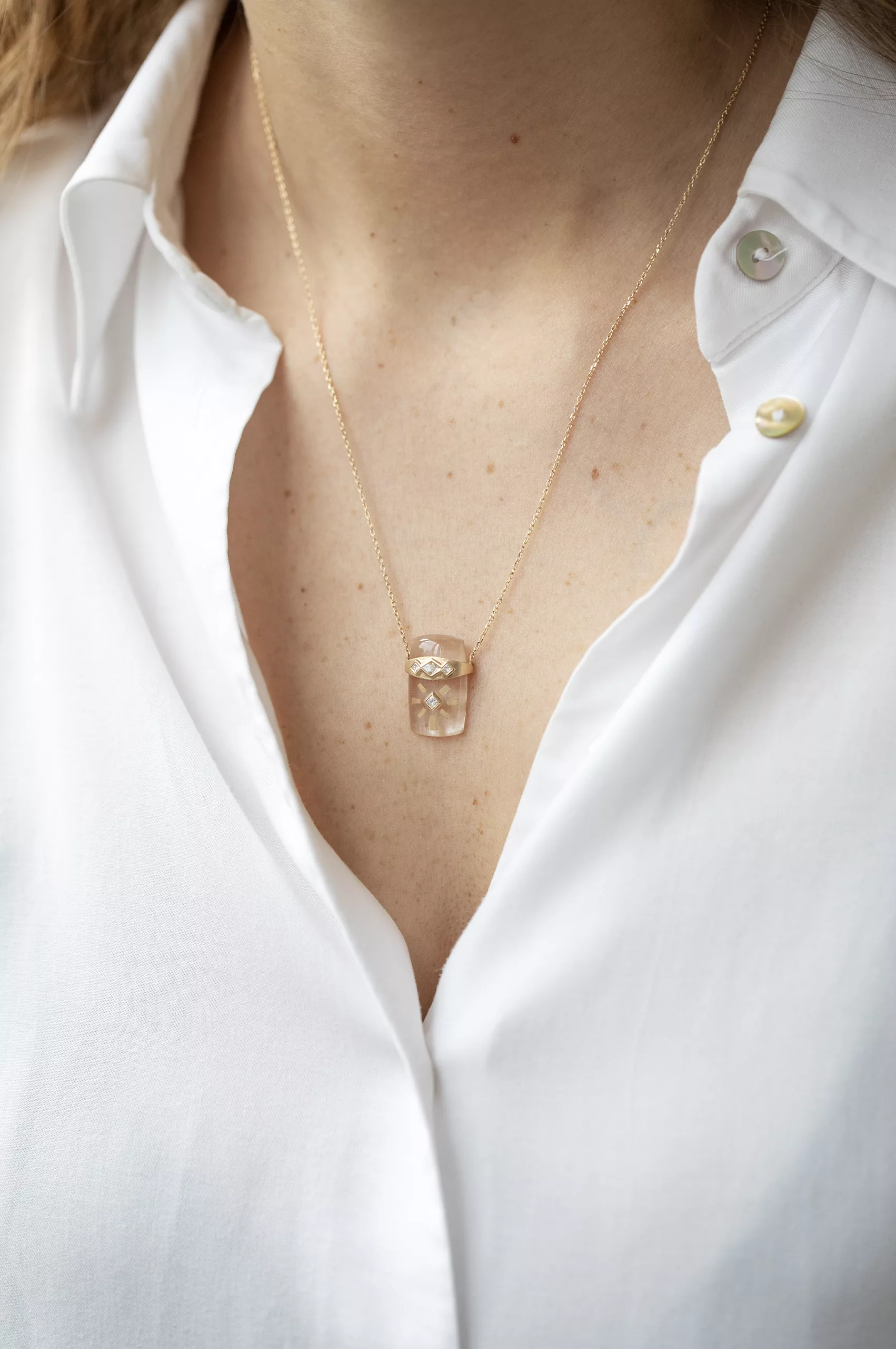 Gold necklace carved crystal quartz sun pendant diamond accents Céline Daoust
