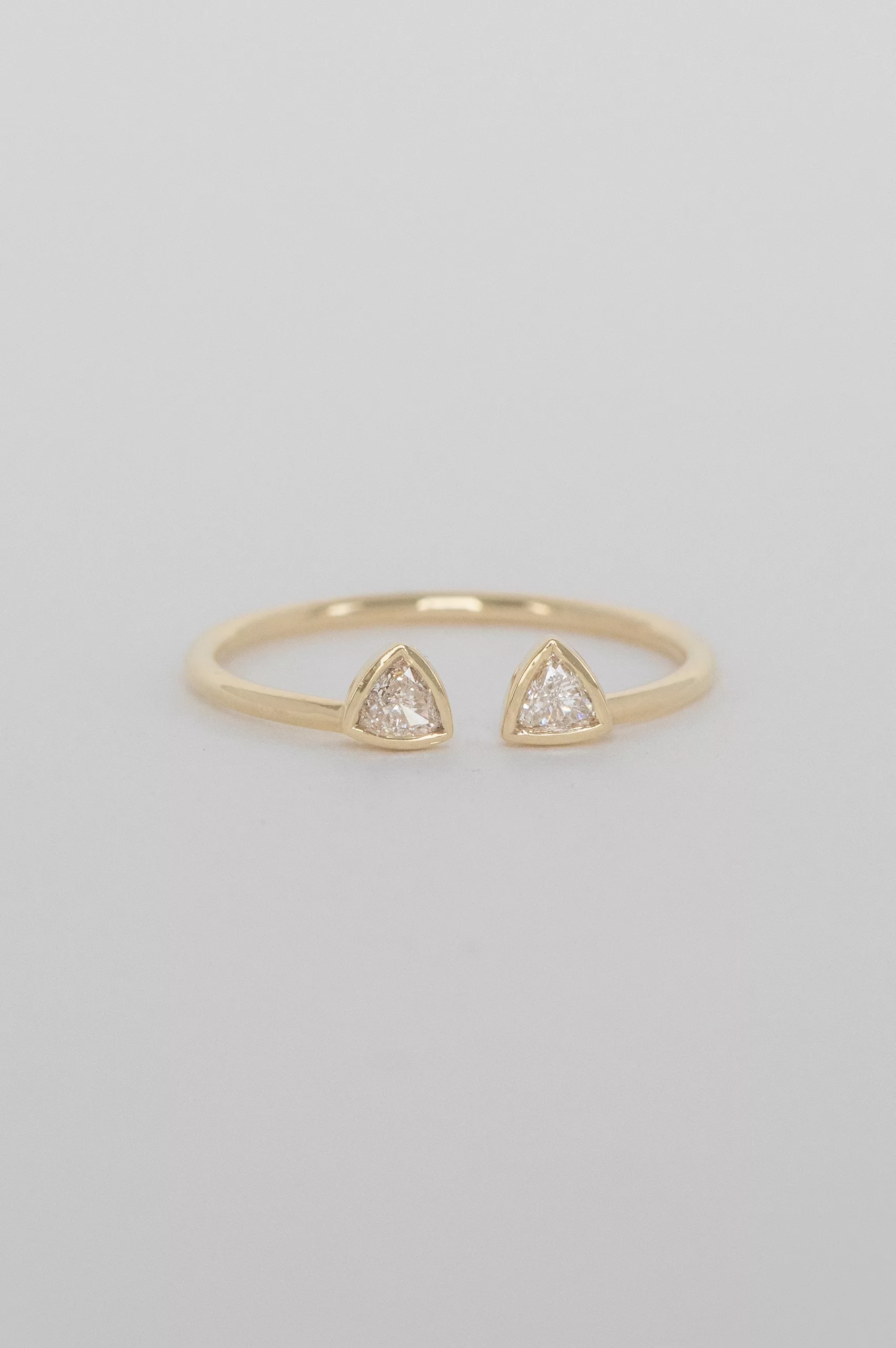 Gold open ring two triangle-cut diamonds cat ear motif Celine Daoust