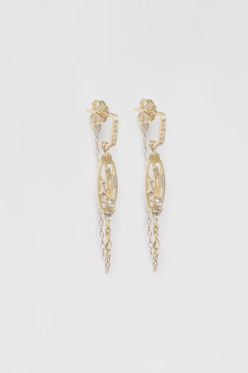 Gold wire drop earrings set with pear-cut moonstones in bezel settings, each finished with a diamond accent and a delicate gold ball drop.