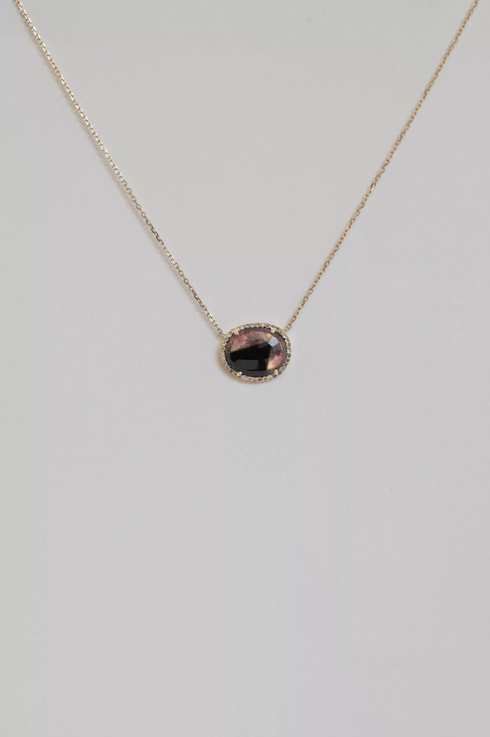 Yellow gold necklace oval watermelon tourmaline pavé diamond halo pendant chain Celine Daoust