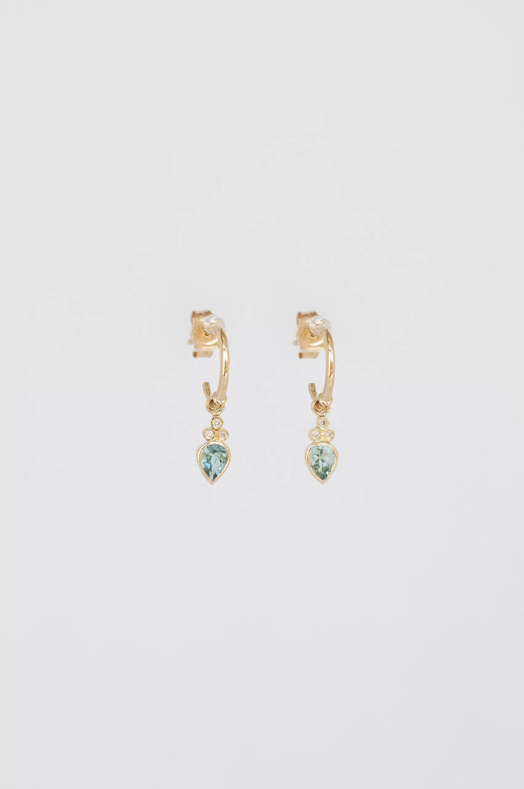 Gold hoop earrings pear blue tourmaline drop diamond accent Céline Daoust
