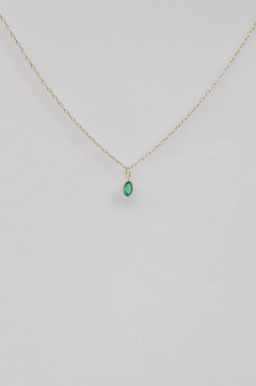 Yellow gold necklace marquise emerald bezel pendant delicate chain Celine Daoust