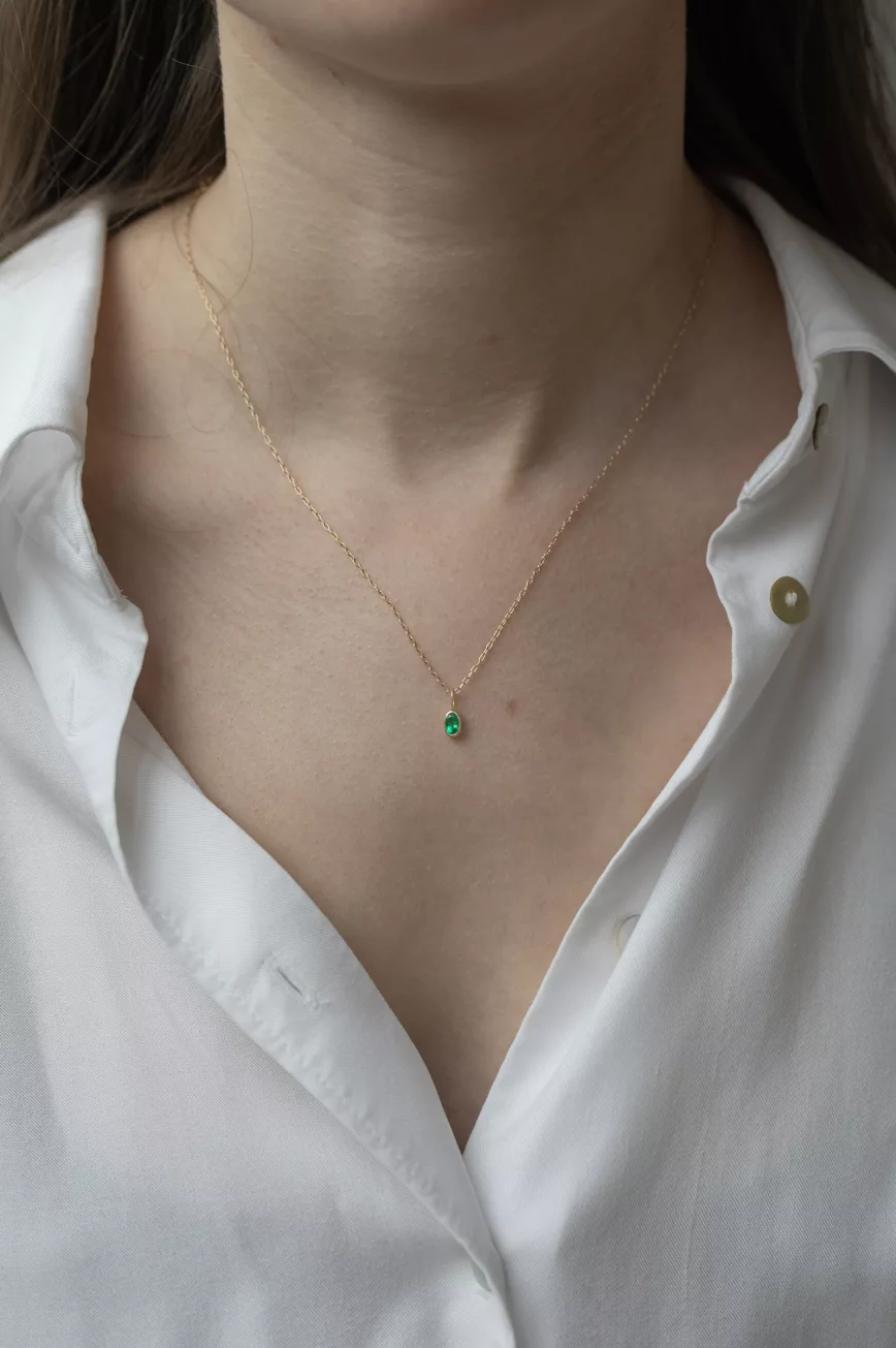 Yellow gold necklace marquise emerald bezel pendant delicate chain Celine Daoust